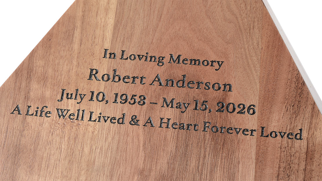 Close-up detail of personalized engraving on the Pyramid Walnut Urn for Ashes