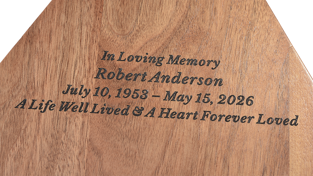 Close-up detail of personalized engraving on the Triangle Walnut Urn for Ashes