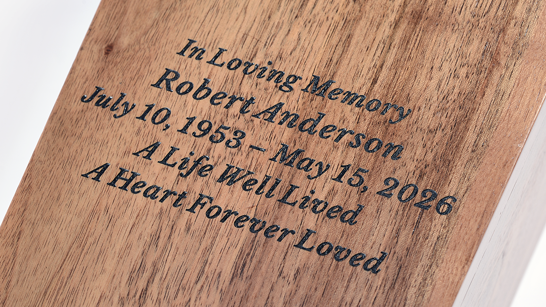 Vatican Legacy Memorial Urn by Royal Memorials, showing a close-up detail of custom personalized engraving