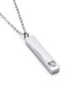 Angled view of Clear Crystal Heart Bar Cremation Necklace for Ashes featuring a raised clear heart crystal accent