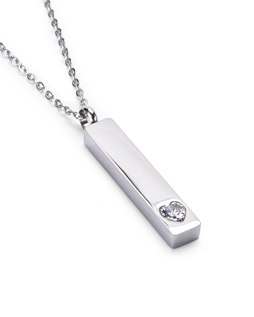 Clear Crystal Heart Bar Cremation Necklace for Ashes - Main View Angled view of Clear Crystal Heart Bar Cremation Necklace for Ashes featuring a raised clear heart crystal accent
