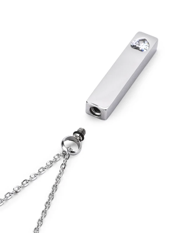 Threaded top screw bail opening and rubber gasket on Clear Crystal Heart Bar Cremation Necklace for Ashes