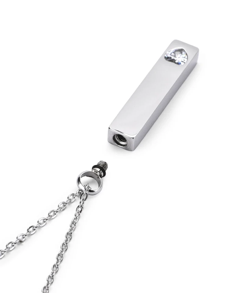 Threaded top screw bail opening and rubber gasket on Clear Crystal Heart Bar Cremation Necklace for Ashes