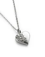 Angled view of crystal angel wing heart cremation necklace for ashes in polished stainless steel