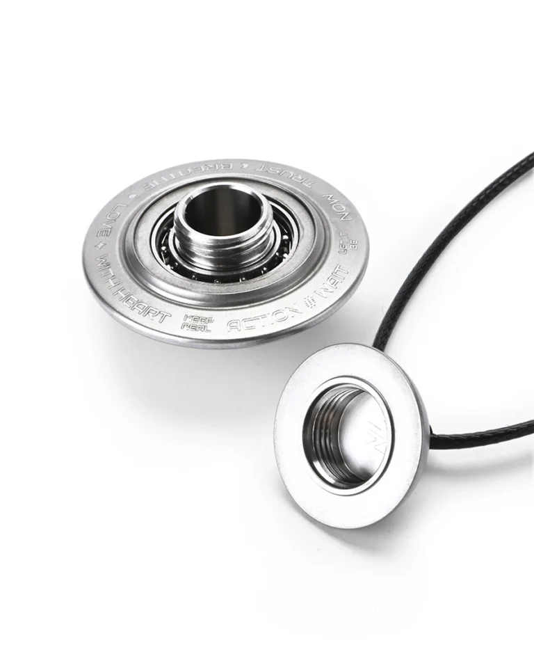 Disassembled satin gray titanium cremation necklace showing threaded waterproof urn chamber and bearing