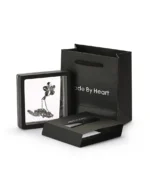 Royal Memorials luxury black presentation box and floating frame display for flower cremation necklace