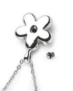Back view of flower cremation necklace showing secure screw-in back opening for ashes