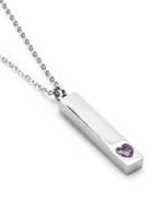 Angled view of Lavender Crystal Heart Bar Cremation Necklace for Ashes featuring a raised lavender heart crystal accent