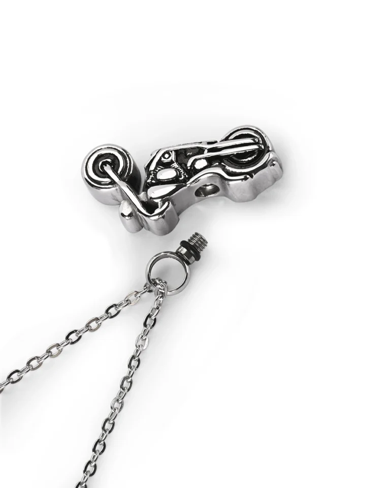 Top view showing unscrewed bail opening of motorcycle cremation necklace for ashes