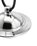 Disassembled titanium cremation necklace showing threaded waterproof urn chamber and bearing