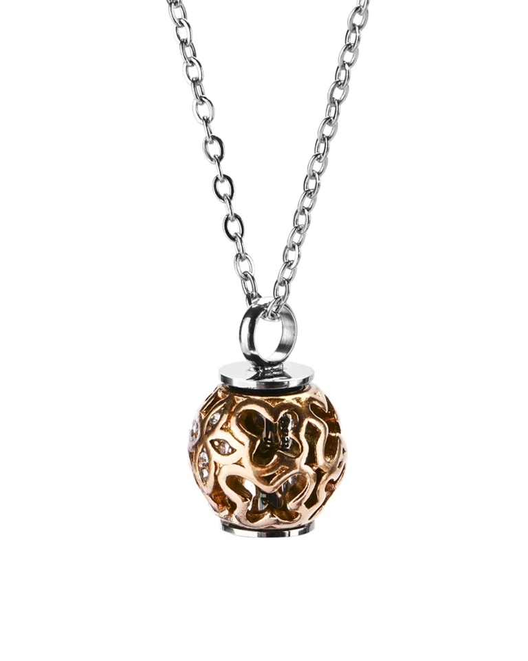Front view of rose gold filigree sphere cage cremation necklace with crystal accents and stainless steel inner cylinder