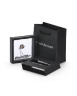 Royal Memorials luxury black presentation box and display frame for rose gold filigree cylinder cremation necklace