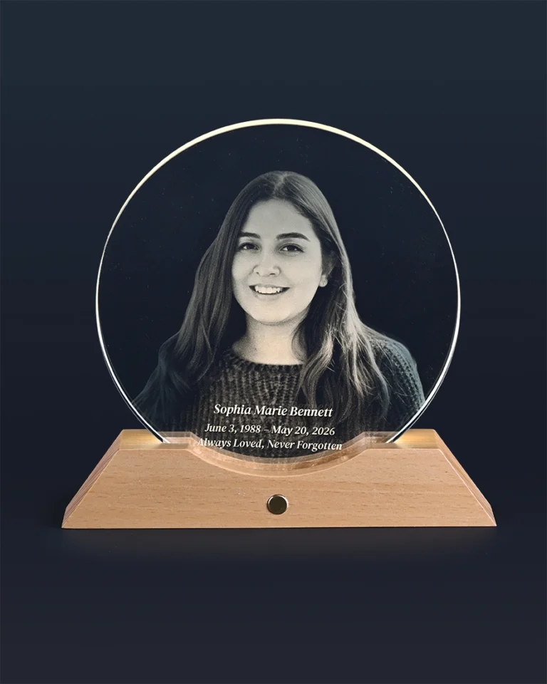 Front view of 7.1-inch round memorial glass light with custom laser engraving