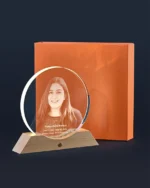 Round memorial keepsake light displayed with premium orange gift box