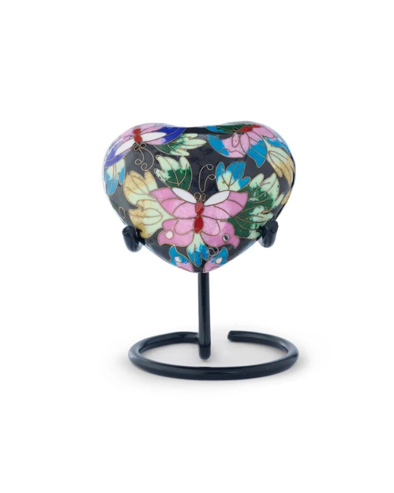 Royal Memorials Butterfly Garden Cloisonne Heart Keepsake Urn with butterfly design on display stand