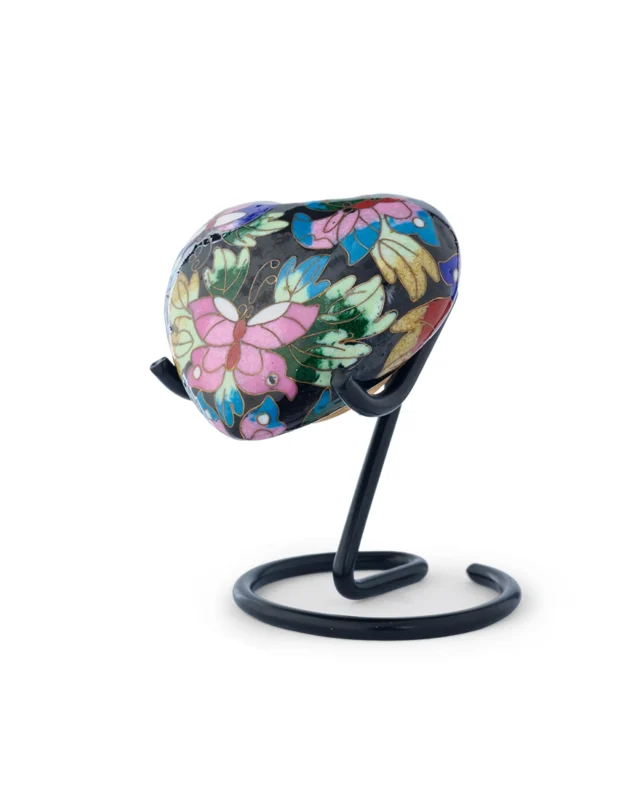 Close-up of cloisonne enamel detail on Butterfly Garden heart-shaped keepsake urn