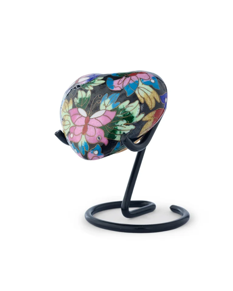 Close-up of cloisonne enamel detail on Butterfly Garden heart-shaped keepsake urn