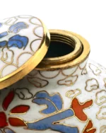 Close-up detail of Hummingbird Blossom cloisonne enamel craftsmanship on Royal Memorials keepsake urn
