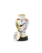 Royal Memorials Hummingbird Blossom keepsake urn with threaded lid removed to show brass interior