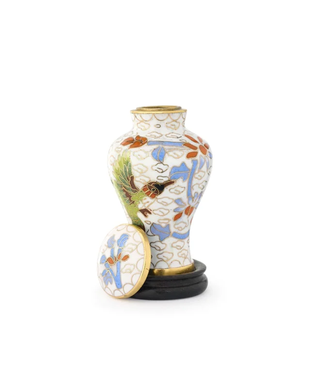 Royal Memorials Hummingbird Blossom keepsake urn with threaded lid removed to show brass interior