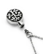 Top view showing unscrewed top bail with rubber gasket seal and inner chamber of tree of life cremation necklace