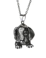 Detailed dog stainless steel pendant showing sculpted floppy ears and expressive facial features