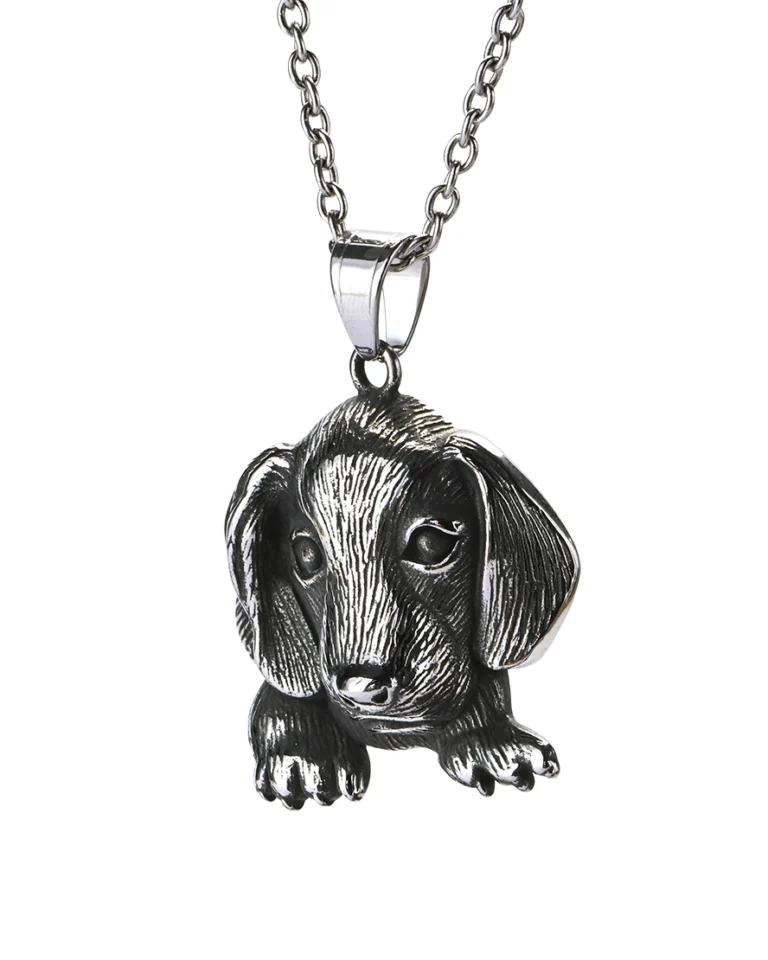Detailed dog stainless steel pendant showing sculpted floppy ears and expressive facial features