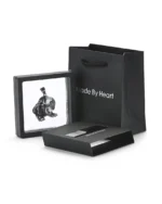 Dog stainless steel keepsake necklace displayed in a floating presentation frame from Royal Memorials