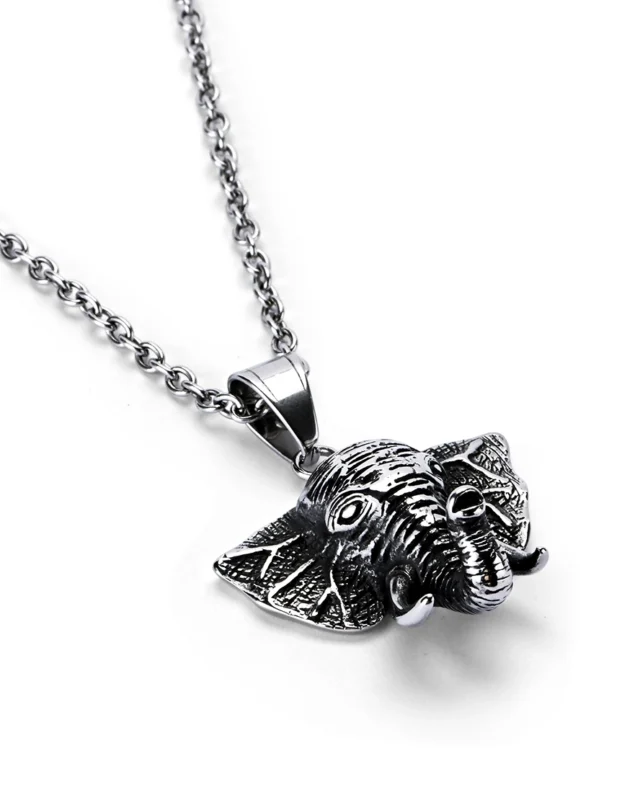 Angled view of elephant stainless steel pendant highlighting three-dimensional features and tusks