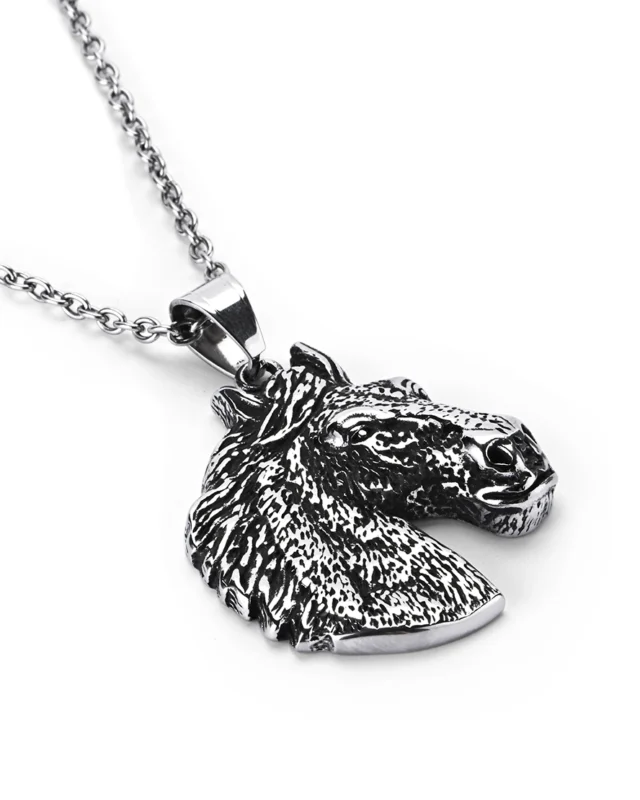 Angled view of horse head stainless steel pendant highlighting three-dimensional mane ridges and sculpted features