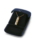 Ivory lily cloisonne cremation necklace displayed in a luxury double-door velvet presentation box