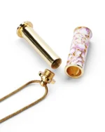Pink peony cloisonne cremation necklace showing screw-in top bail and inner memorial chamber