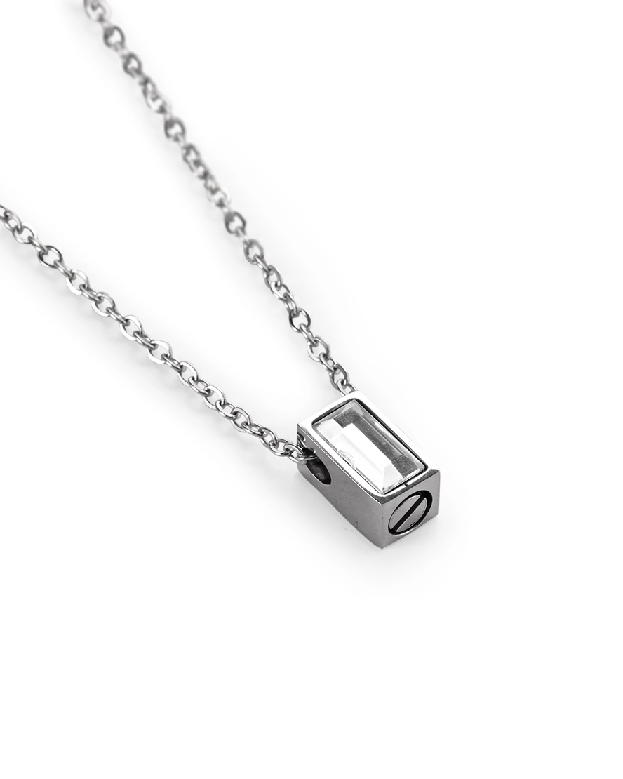 Bar Urn Necklace for Ashes – Clear Rectangle Clear rectangle bar urn necklace for ashes with faceted center and compact 316L stainless steel body