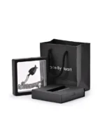 Black angel wing urn necklace displayed in a floating presentation frame with gift packaging