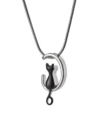 Front view of black cat cremation necklace with cat seated inside a polished crescent moon