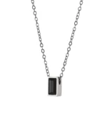 Front view of black rectangle cremation necklace with faceted dark center and polished stainless steel frame
