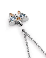 Screw-in top opening and rubber gasket on blue butterfly urn necklace for ashes