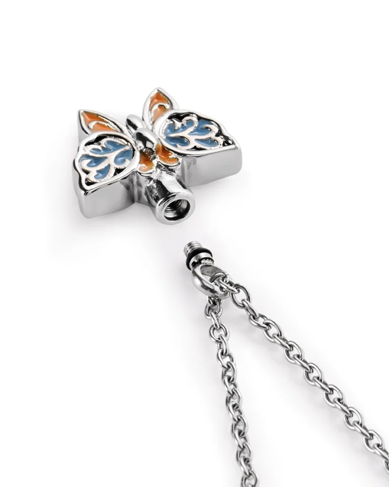 Screw-in top opening and rubber gasket on blue butterfly urn necklace for ashes