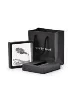 Feather cremation necklace displayed in a presentation frame with gift packaging