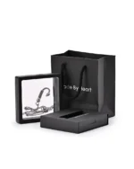 Fish hook urn necklace displayed in a presentation frame with gift packaging