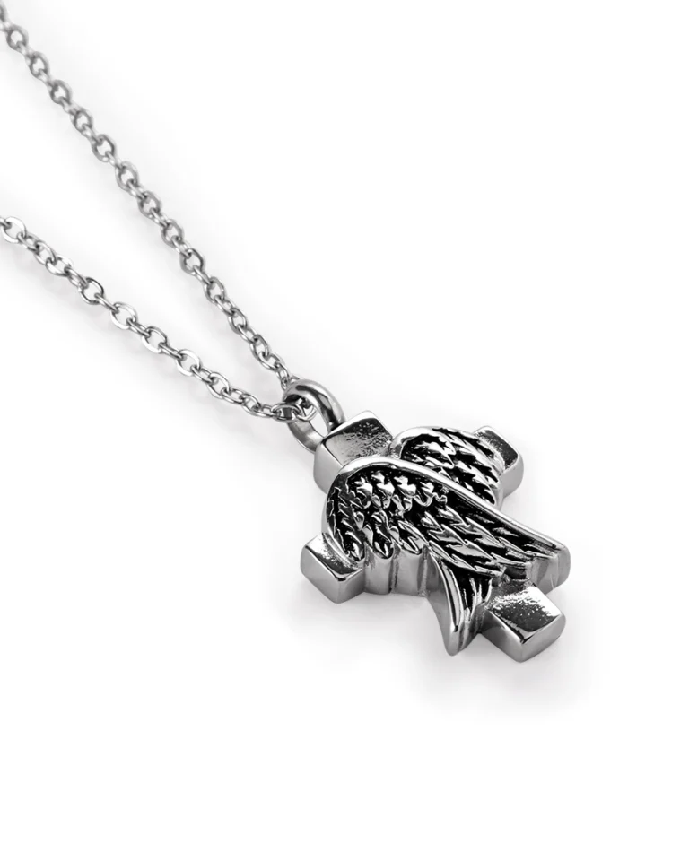 Folded angel wings cross urn necklace for ashes with layered feather wings over a polished 316L stainless steel cross