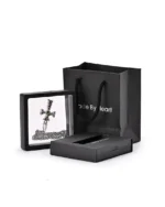 Green stone Celtic cross urn necklace displayed in a presentation frame with gift packaging