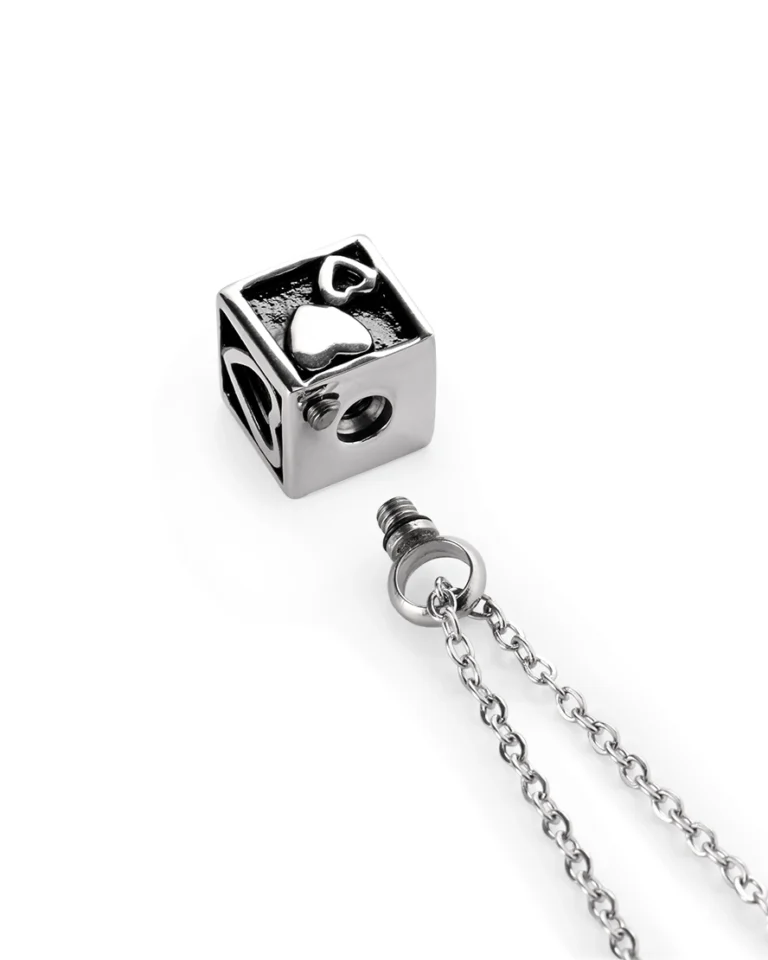 Screw-in top opening and rubber gasket on heart cube urn necklace for ashes