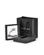 Pearl urn necklace displayed in a floating presentation frame with gift packaging