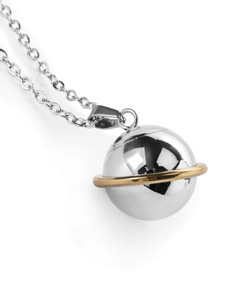 Saturn urn necklace for ashes with polished silver-tone sphere and contrasting gold-tone planetary ring