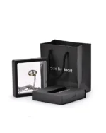Saturn urn necklace displayed in a floating presentation frame with gift packaging