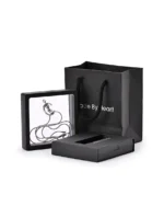 Silver cat moon urn necklace displayed in a presentation frame with gift packaging