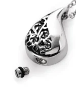 Bottom screw opening and rubber gasket on floral teardrop urn necklace for ashes