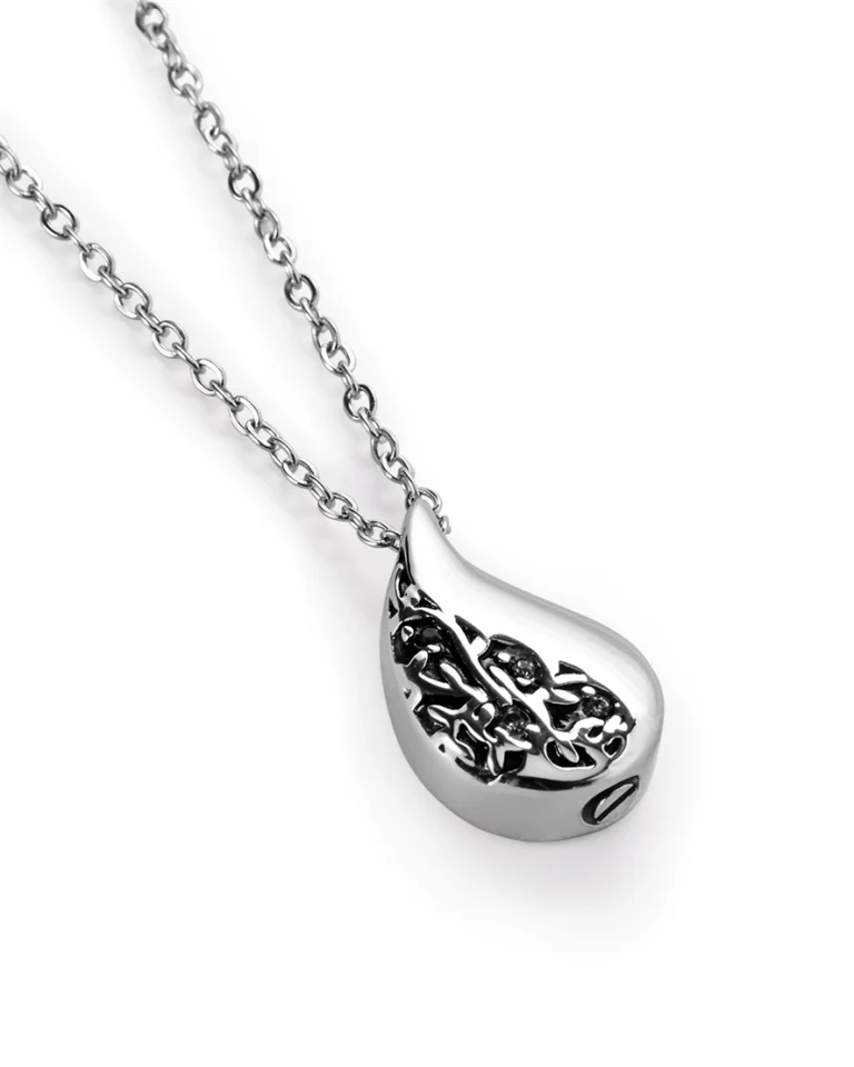 Teardrop urn necklace for ashes with floral detailing, small stone accents and 20 inch stainless steel chain