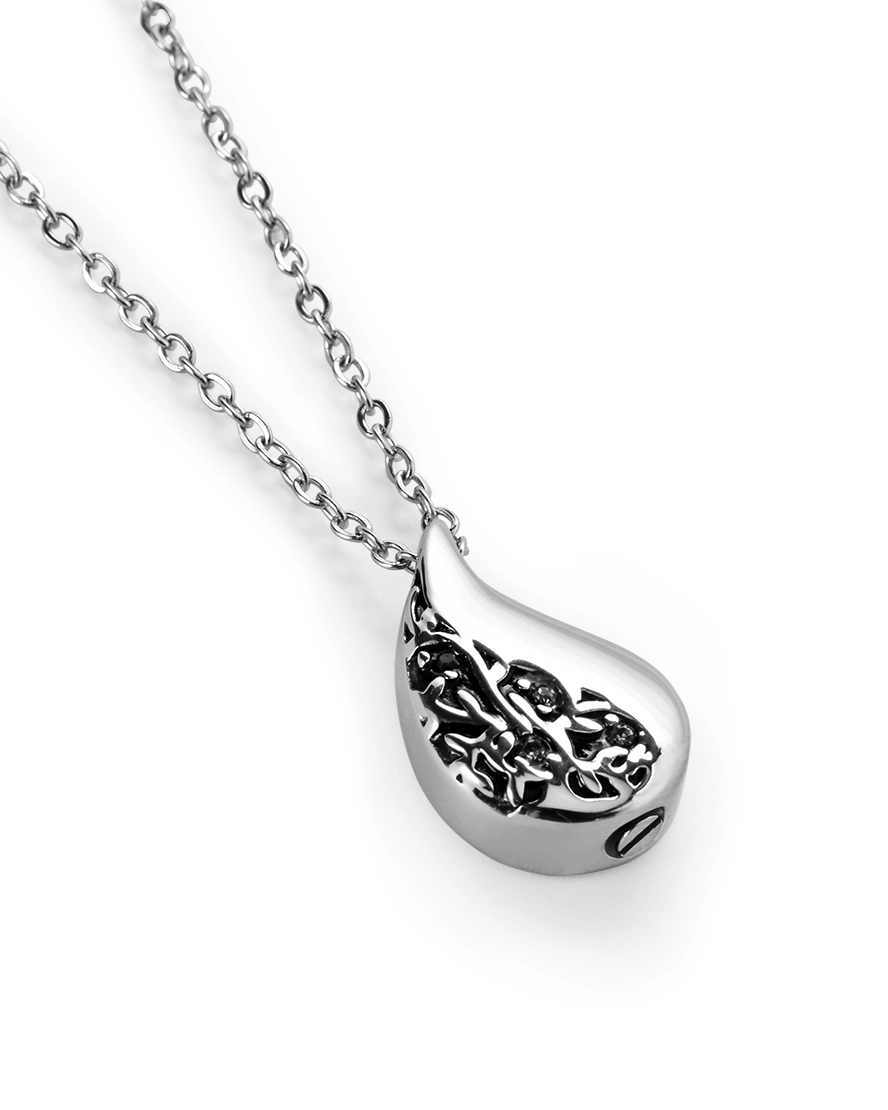 Teardrop Urn Necklace for Ashes Teardrop urn necklace for ashes with floral detailing, small stone accents and 20 inch stainless steel chain